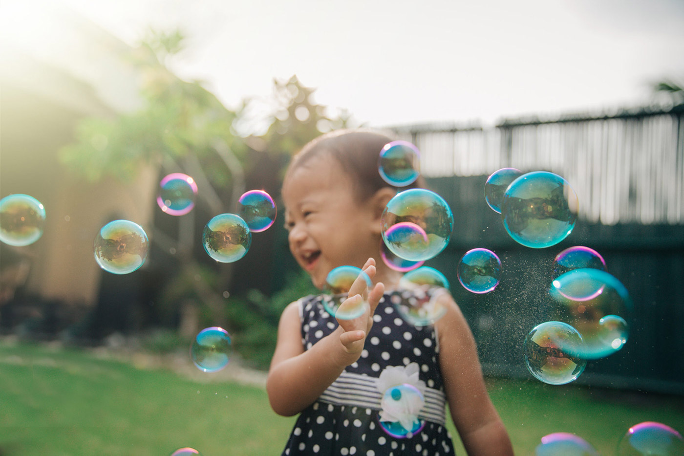 Girl with pig tails smiling